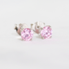 Silver cubic stud with synthetic pink stone