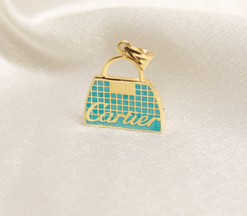 18ct yellow gold blue handbag pendant  2.70g