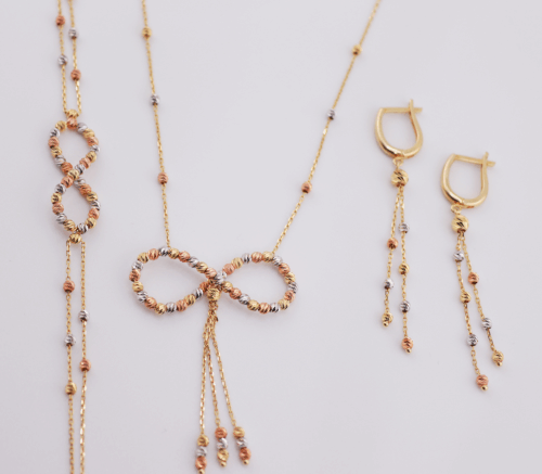 18ct yellow gold tricolour ball necklace, bracelet and drop earring set in infinity design