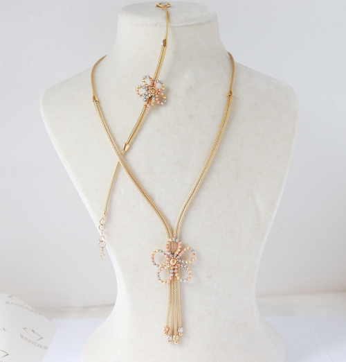 18ct yellow gold mesh necklace, bracelet and earring set with engraved balls flower style