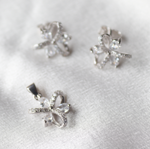 Silver Bow style pendant anf earring set with cubics