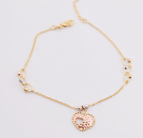 18ct yelow gold ball bracelet with heart centre charm