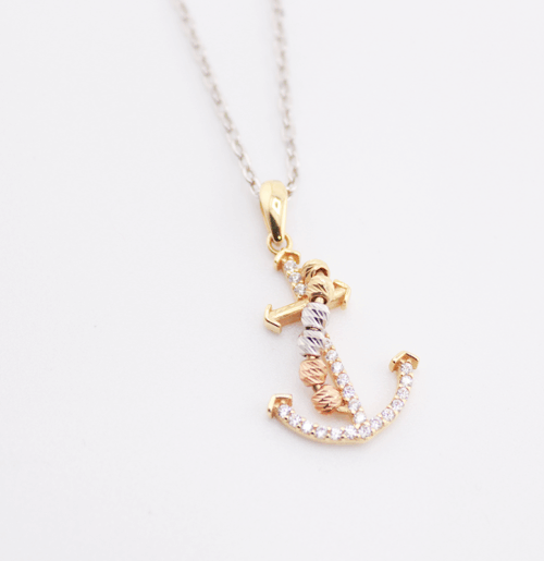 18ct white gold chain with 18ct yellow gold anchor pendant