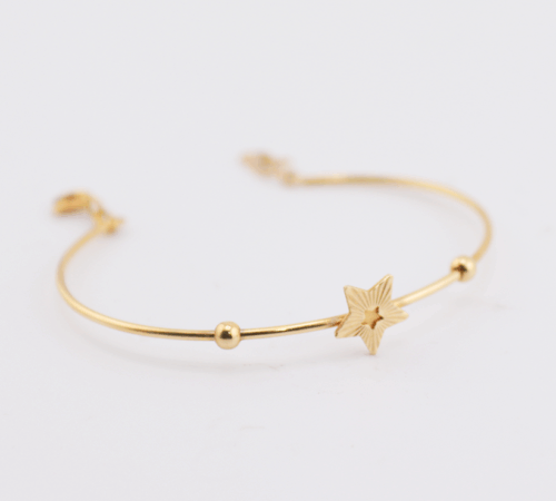 18ct yellow gold baby bangle bracelet with star centre piece