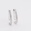 Silver hoop earrings with cubics in channel