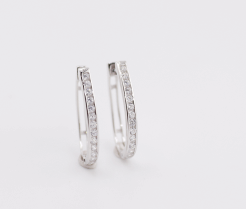 Silver hoop earrings with cubics in channel