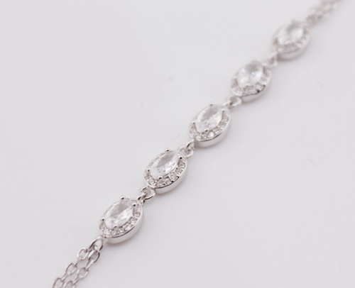Silver bracelet with oval cubic halos