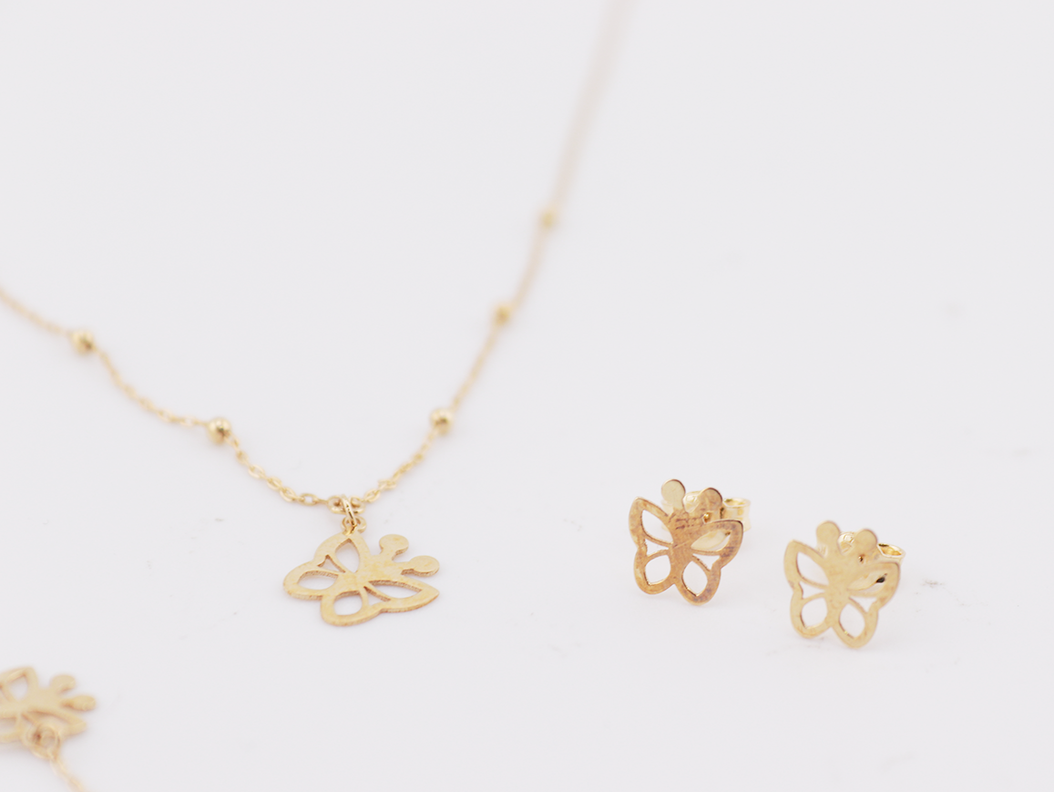 18ct yellow gold fancy necklace, bracelet and earring set with butterfly charm