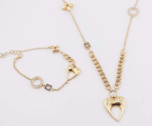 18ct yellow gold fancy chain and bracelet set with cubics