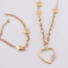 18ct yellow gold fancy chain and bracelet set with charms and cubics